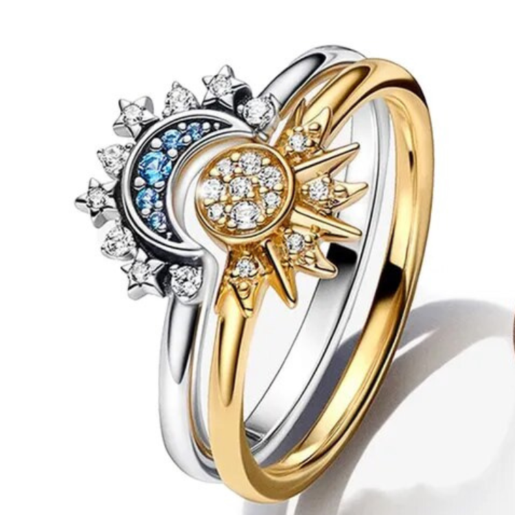 Shimmering Silver Crystal Ring with Moon and Sun Design