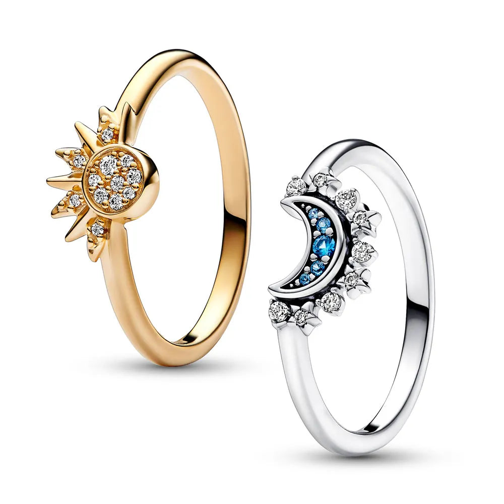 Shimmering Silver Crystal Ring with Moon and Sun Design
