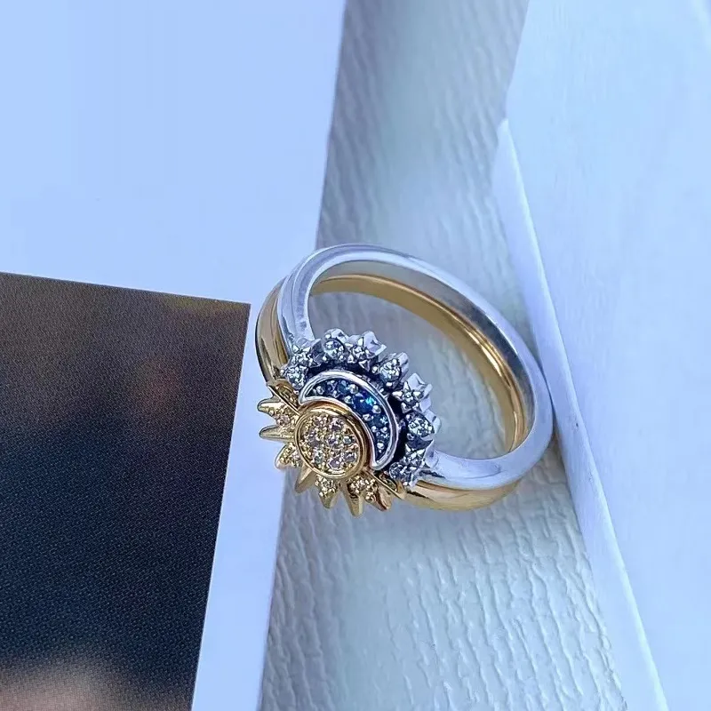 Shimmering Silver Crystal Ring with Moon and Sun Design